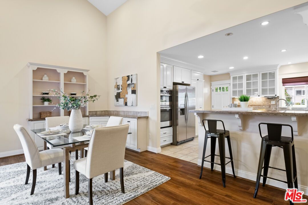 Dining room, Interior, Kitchen, Recessed Lighting, Stainless Steel Appliances, Wood Texture Flooring