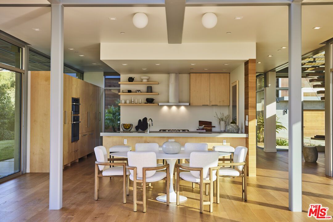 Dining room, Interior, Kitchen, Recessed Lighting, Stainless Steel Appliances, Wood Texture Flooring