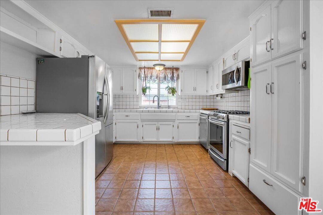 Interior, Kitchen, Stainless Steel Appliances, Tile Countertops