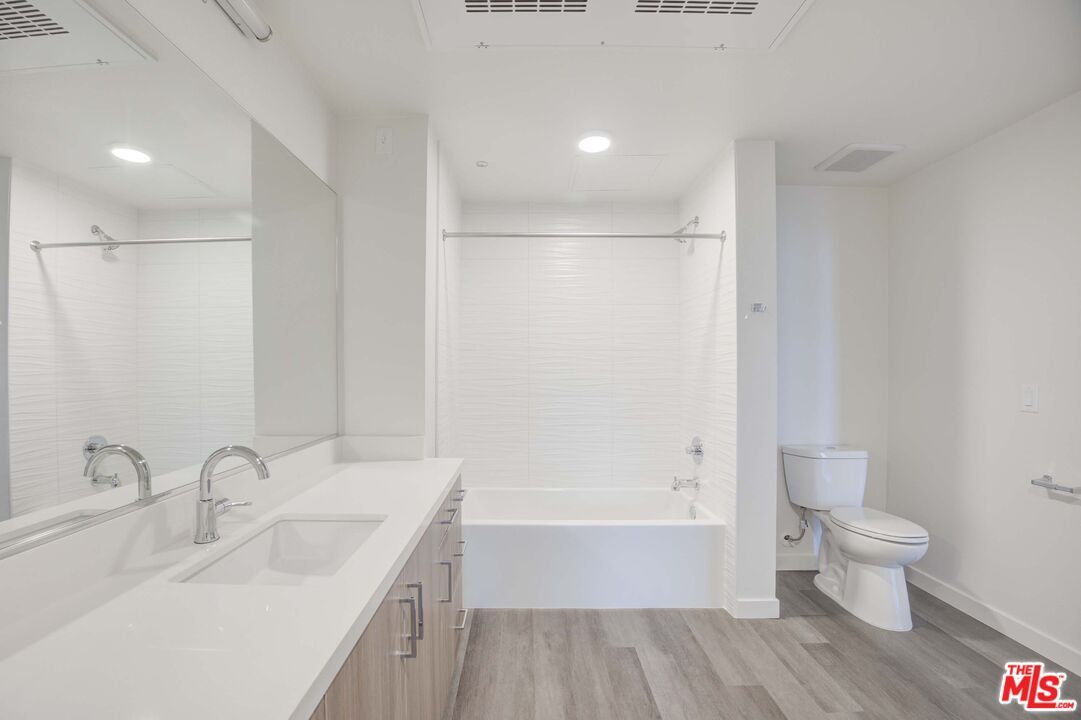 Bathroom, Dual Sink Vanities, Interior, Recessed Lighting, Wood Texture Flooring