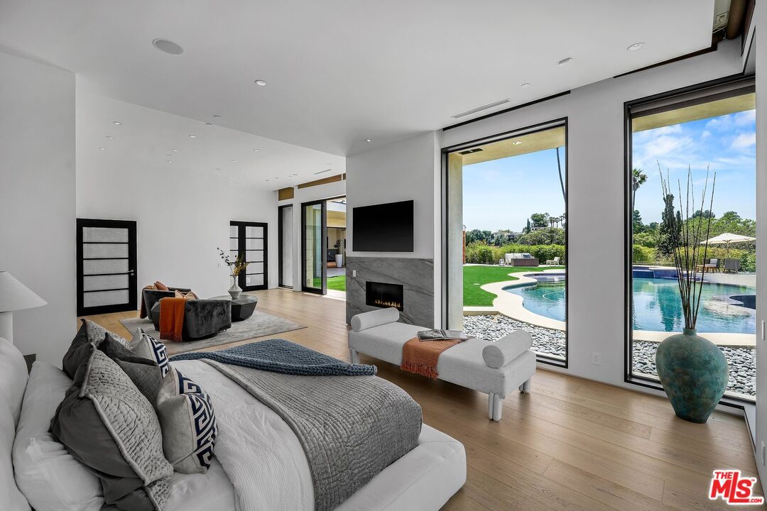 Bedroom, Fireplace, Interior, Recessed Lighting, Wood Texture Flooring