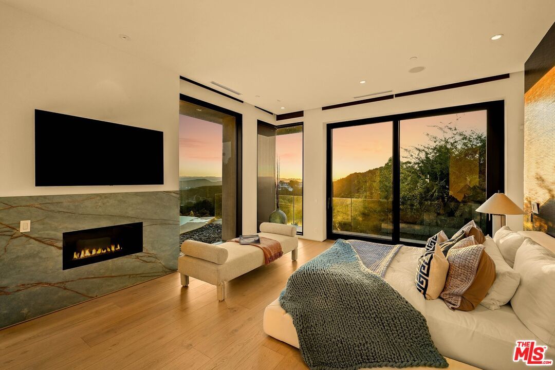 Bedroom, Fireplace, Interior, Recessed Lighting, Wood Texture Flooring