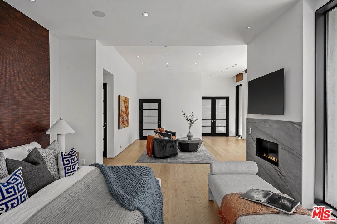 Bedroom, Fireplace, Interior, Living room, Recessed Lighting, Wood Texture Flooring