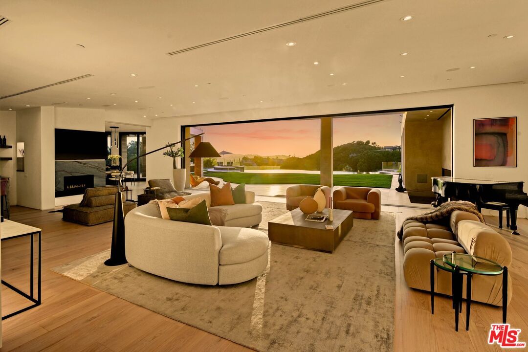 Fireplace, Interior, Living room, Piano, Recessed Lighting, Wood Texture Flooring
