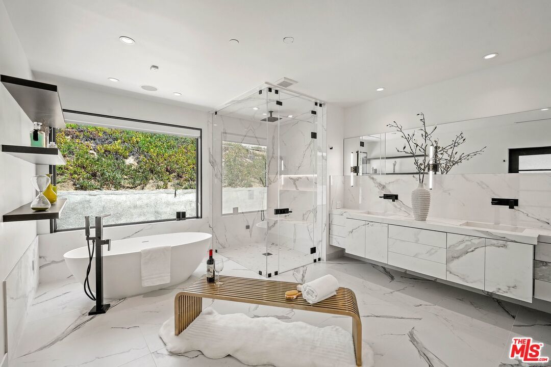 Bathroom, Dual Sink Vanities, Free Standing Baths, Glass Shower, Interior, Marble, Marble Walls, Recessed Lighting