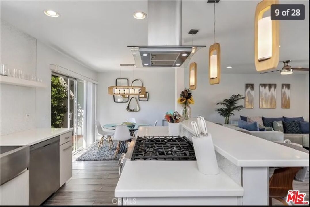 Dining room, Interior, Kitchen, Living room, Pendant Lights, Recessed Lighting, Stainless Steel Appliances, Wood Texture Flooring