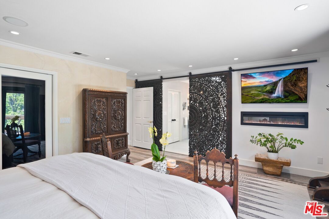 Bedroom, Fireplace, Interior, Recessed Lighting, Wood Texture Flooring