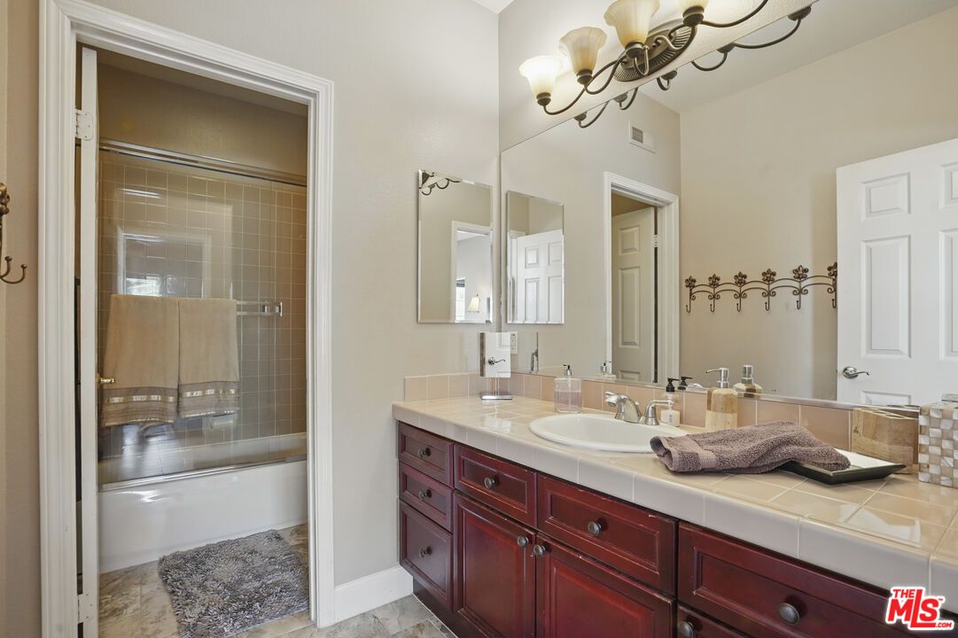 Bathroom, Dual Sink Vanities, Glass Shower, Interior, Tile Countertops