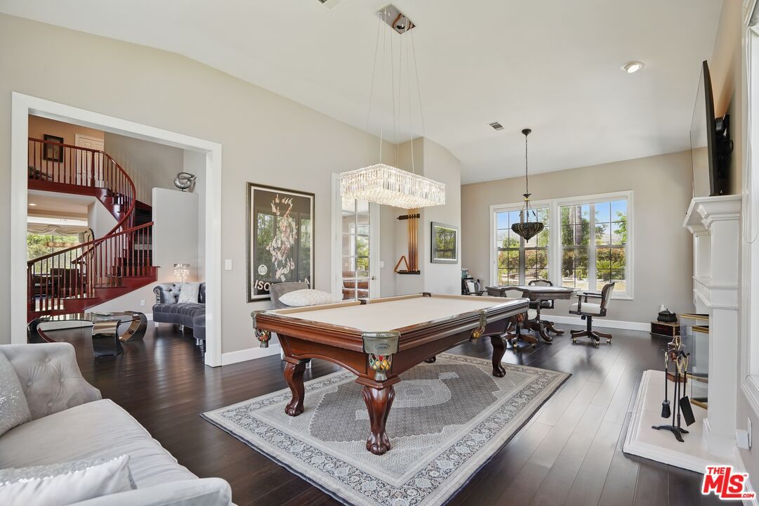 Billiard Table, Chandelier, Game Room, Interior, Pendant Lights, Recessed Lighting, Wood Texture Flooring