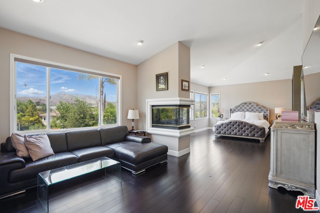 Bedroom, Fireplace, Interior, Living room, Recessed Lighting, Wood Texture Flooring