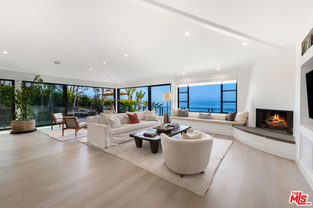 Fireplace, Interior, Living room, Recessed Lighting, Water, Wood Texture Flooring