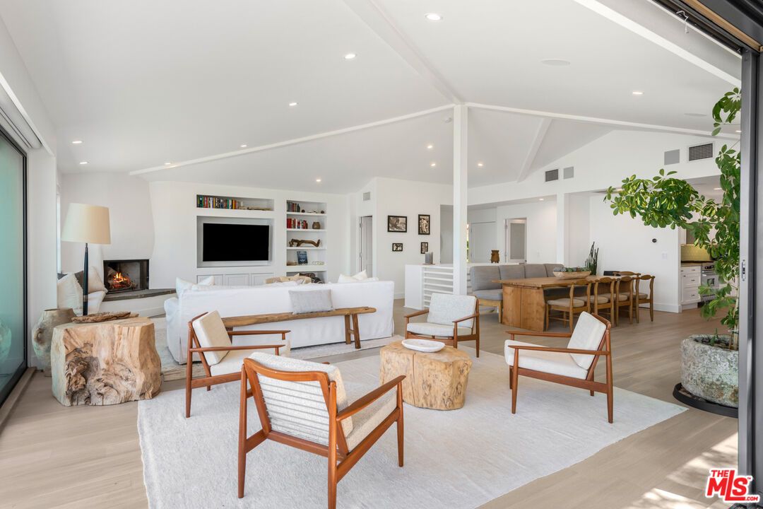 Dining room, Fireplace, Interior, Living room, Recessed Lighting, Wood Texture Flooring