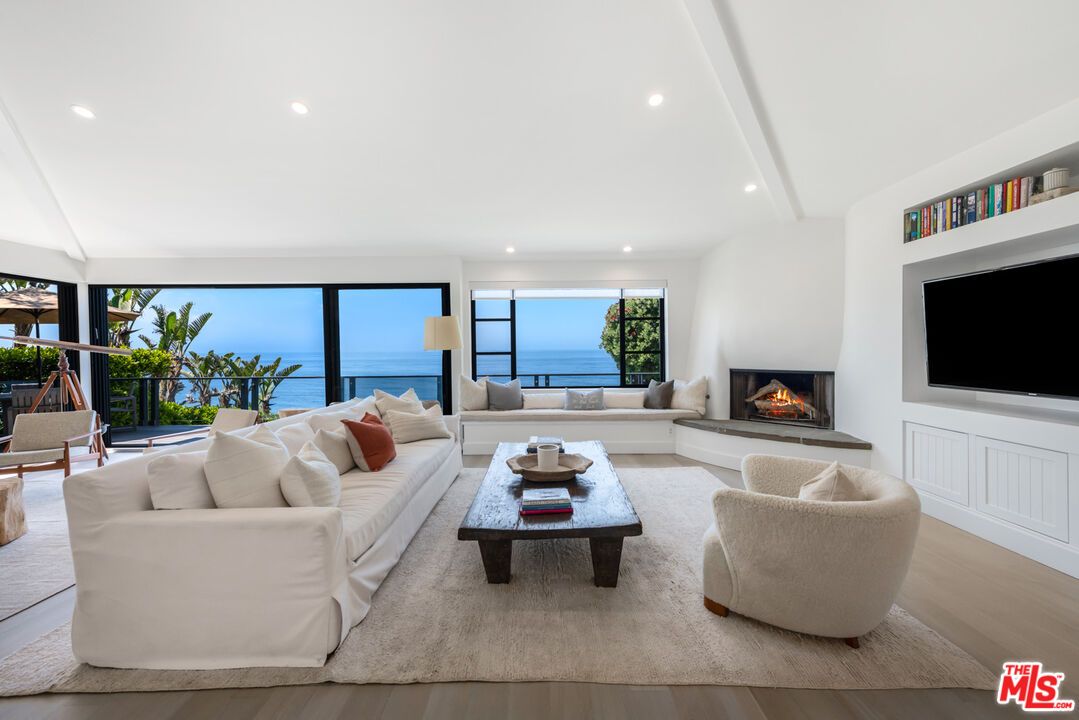 Fireplace, Interior, Living room, Recessed Lighting, Water, Wood Texture Flooring