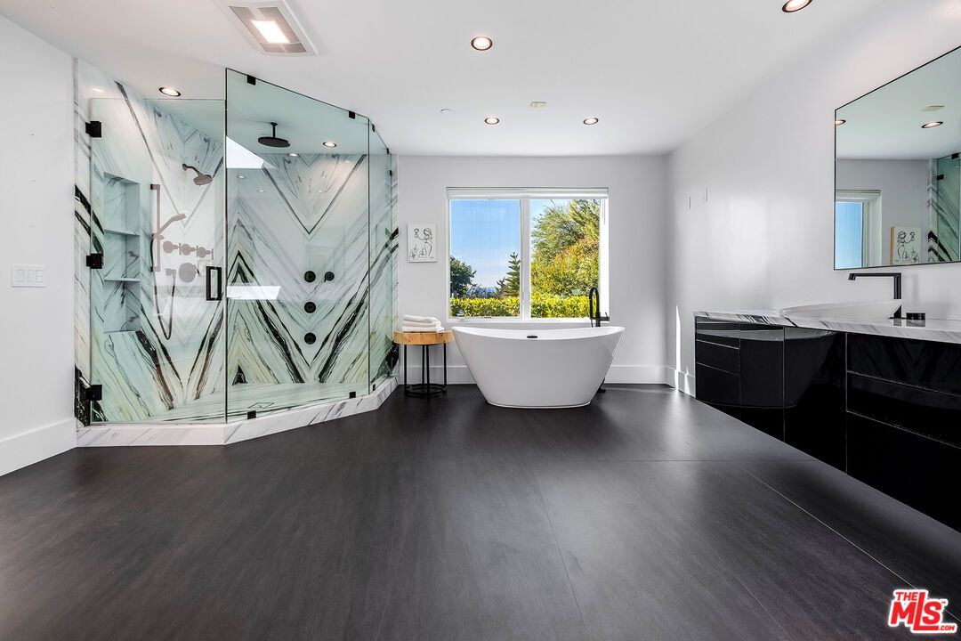Bathroom, Dual Sink Vanities, Free Standing Baths, Glass Shower, Interior, Marble Walls, Recessed Lighting