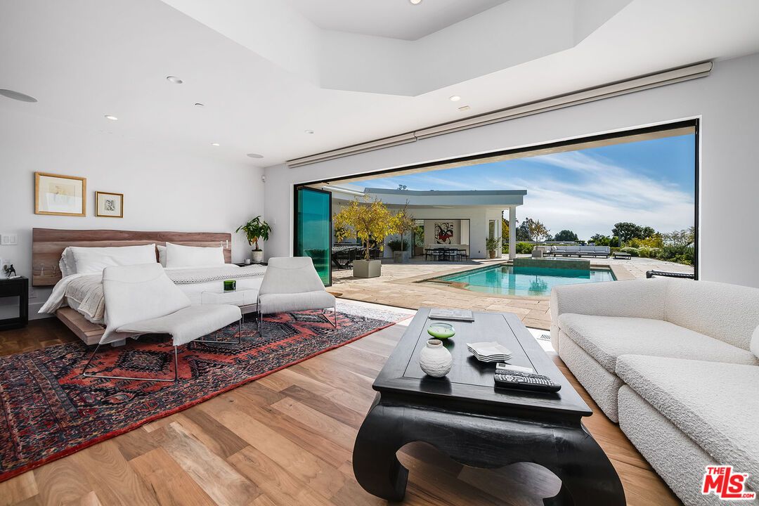 Bedroom, Interior, Living room, Pool, Recessed Lighting, Wood Texture Flooring