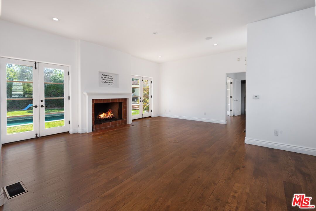 Empty room, Fireplace, Interior, Recessed Lighting, Wood Texture Flooring