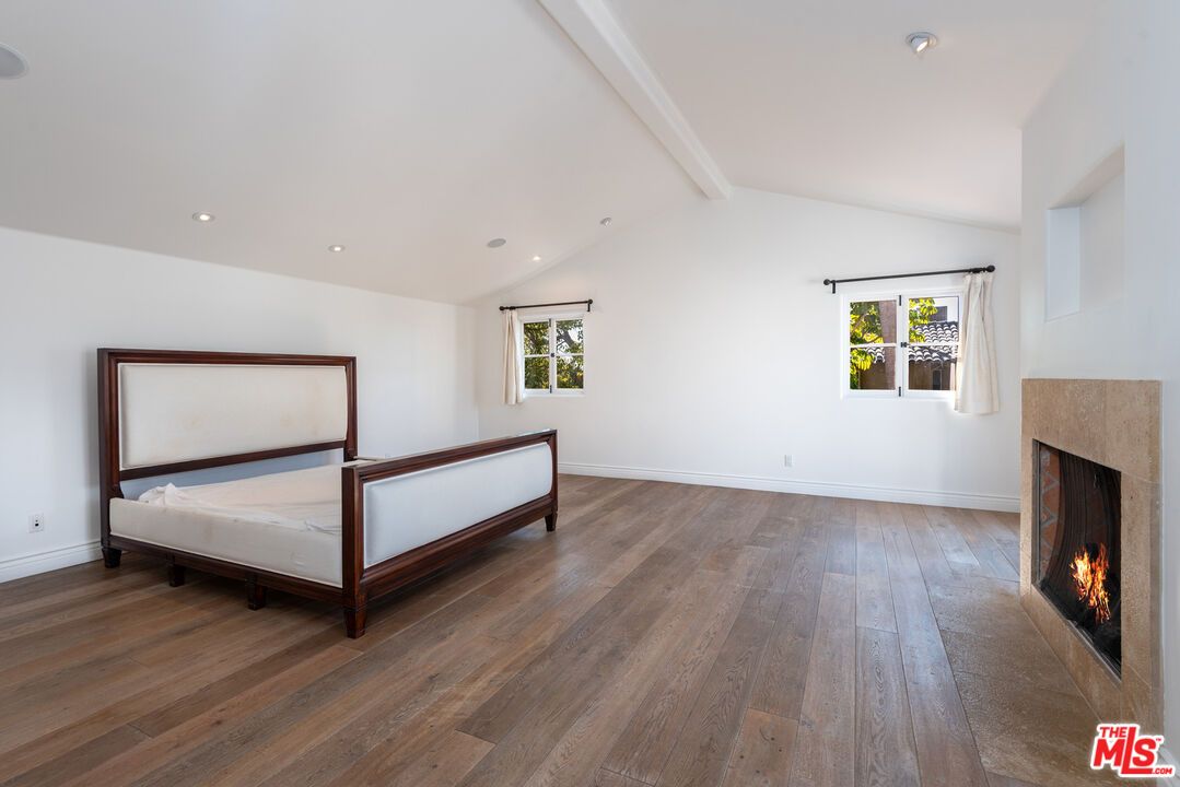 Bedroom, Fireplace, Interior, Recessed Lighting, Wood Texture Flooring