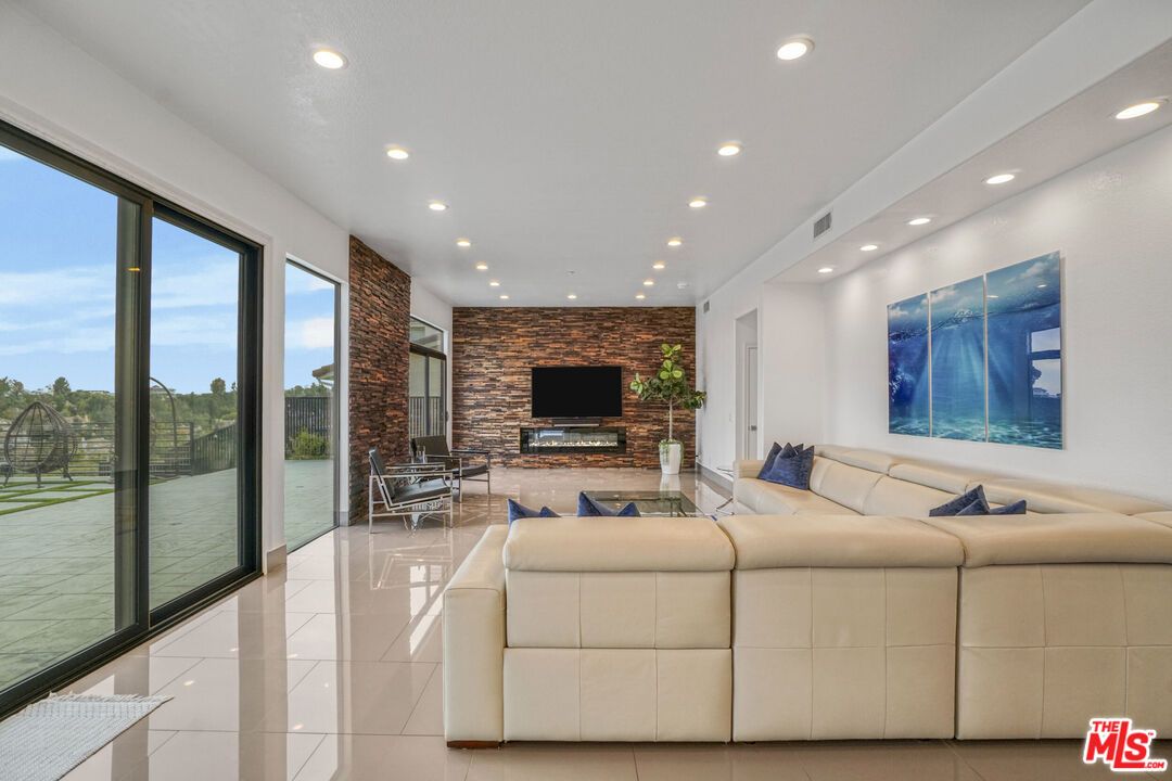Fireplace, Interior, Living room, Recessed Lighting, Stone Walls