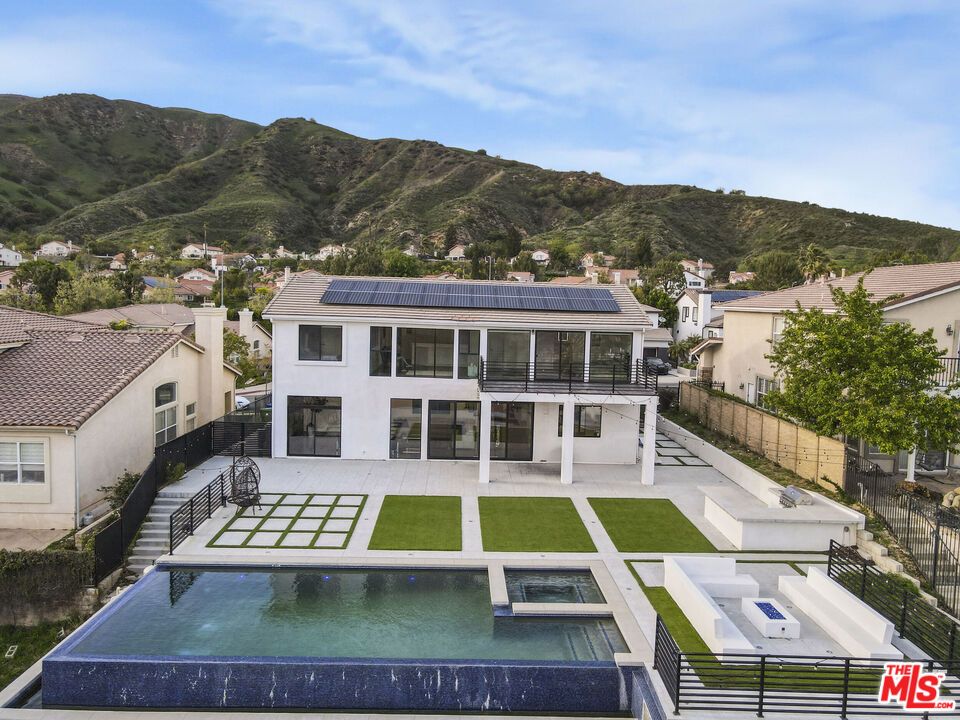 Exterior, Pool, Solar Panels