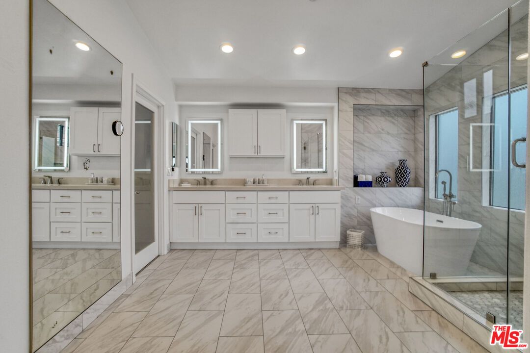 Bathroom, Dual Sink Vanities, Free Standing Baths, Glass Shower, Interior, Marble, Marble Walls, Recessed Lighting