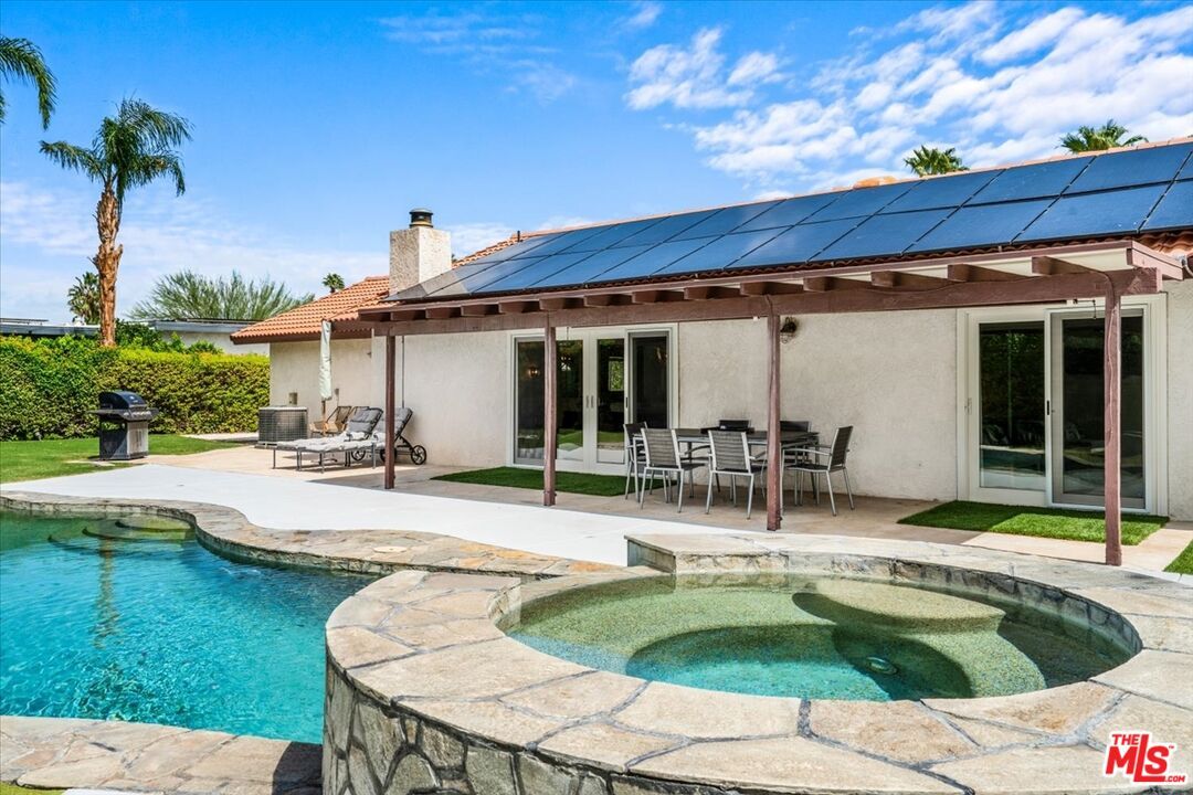 Exterior, Pool, Solar Panels