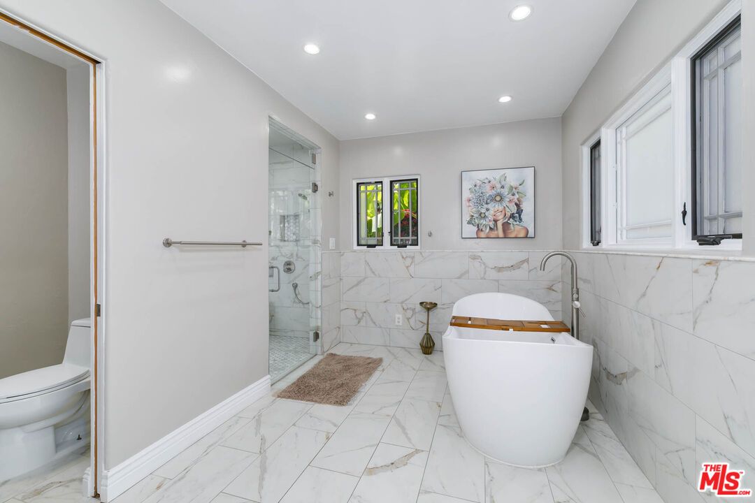 Bathroom, Free Standing Baths, Glass Shower, Interior, Marble, Marble Walls, Recessed Lighting