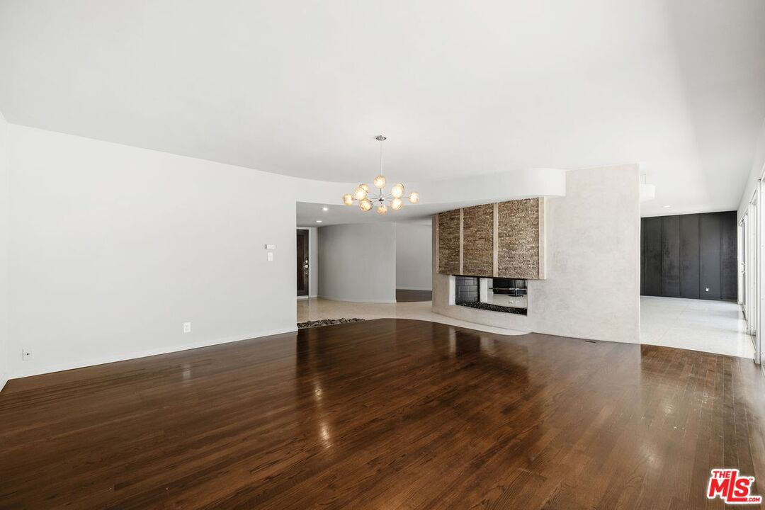 Chandelier, Empty room, Fireplace, Interior, Wood Texture Flooring