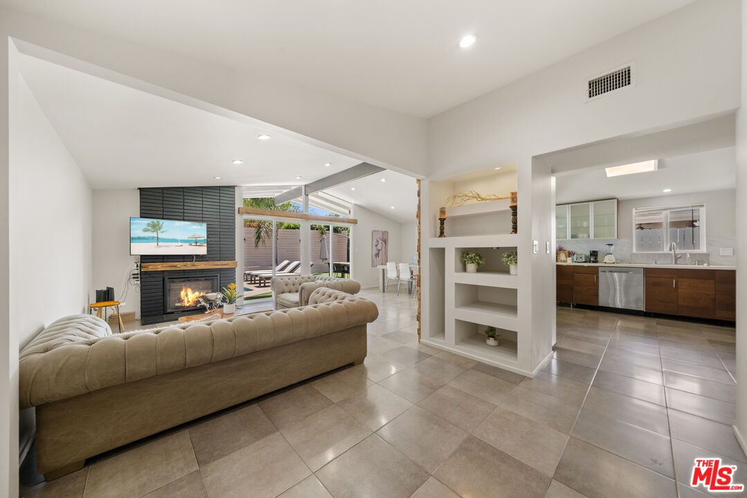 Fireplace, Interior, Kitchen, Living room, Recessed Lighting, Stainless Steel Appliances
