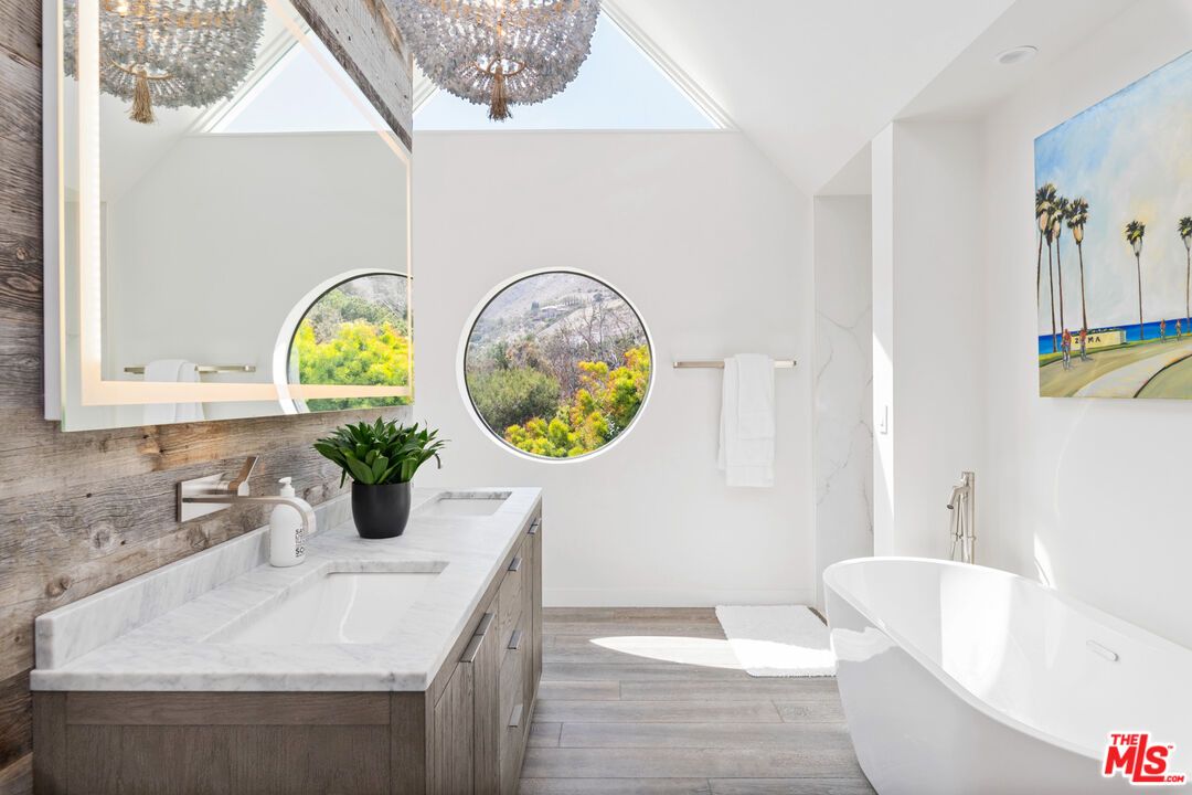 Bathroom, Chandelier, Dual Sink Vanities, Free Standing Baths, Interior, Wood Texture Flooring