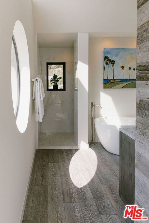 Bathroom, Free Standing Baths, Interior, Marble Walls, Wood Texture Flooring