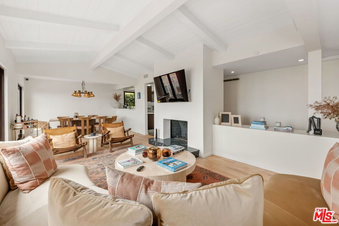 Dining room, Fireplace, Interior, Living room, Recessed Lighting, Wood Texture Flooring