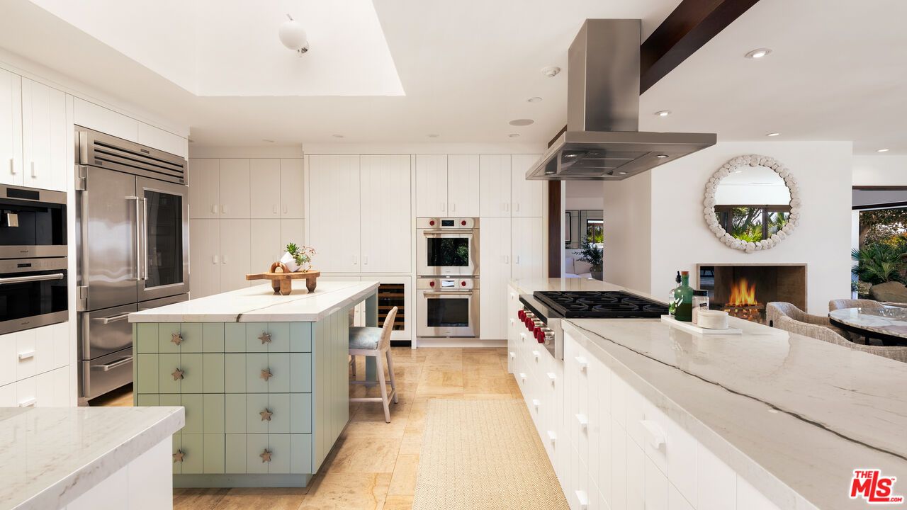 Fireplace, Interior, Kitchen, Recessed Lighting, Stainless Steel Appliances, Wood Texture Flooring