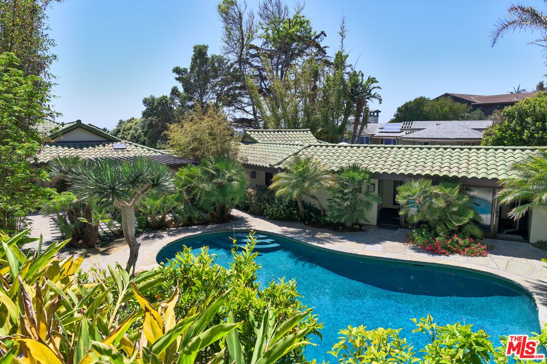 Exterior, Pool, Solar Panels