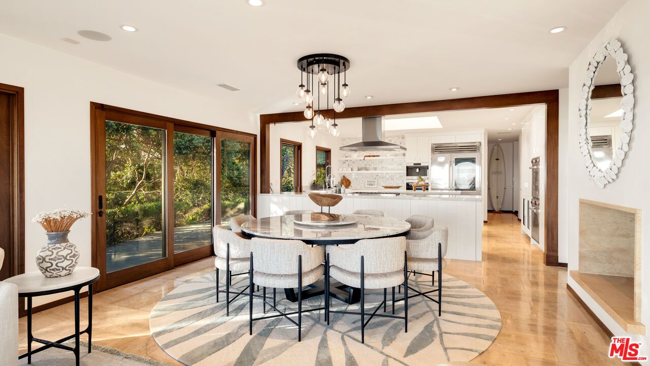 Dining room, Interior, Kitchen, Pendant Lights, Recessed Lighting, Stainless Steel Appliances, Wood Texture Flooring