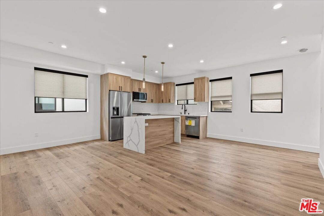 Interior, Kitchen, Pendant Lights, Recessed Lighting, Stainless Steel Appliances, Wood Texture Flooring