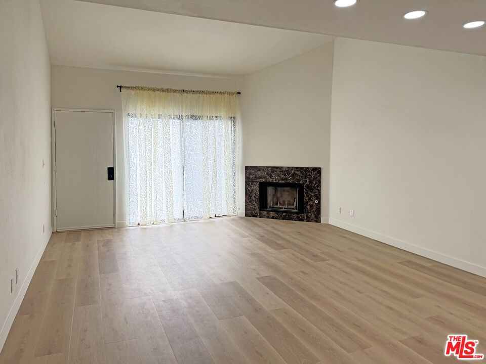 Empty room, Fireplace, Interior, Recessed Lighting, Wood Texture Flooring