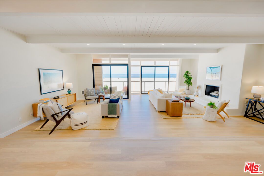 Fireplace, Interior, Living room, Recessed Lighting, Water, Wood Texture Flooring