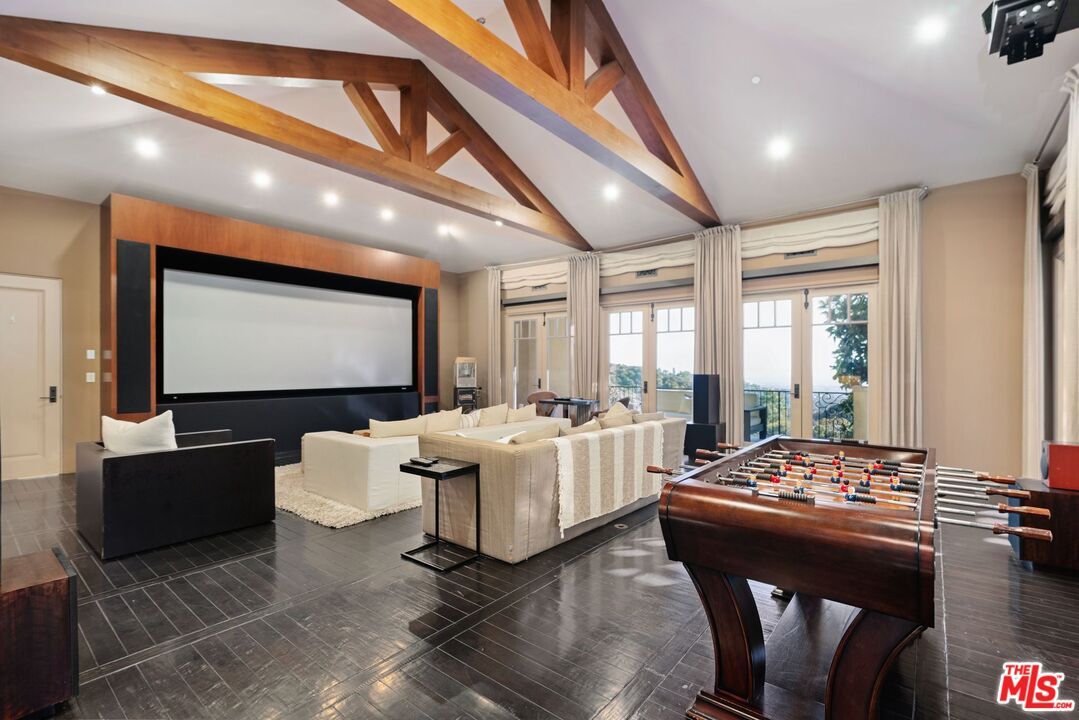Game Room, Interior, Living room, Projection Screen, Recessed Lighting, Wooden Beams, Wood Texture Flooring