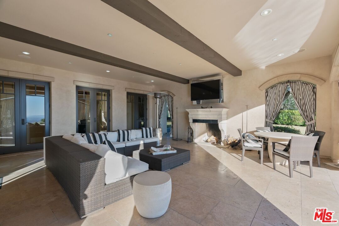 Dining room, Fireplace, Interior, Living room, Recessed Lighting, Water, Wooden Beams