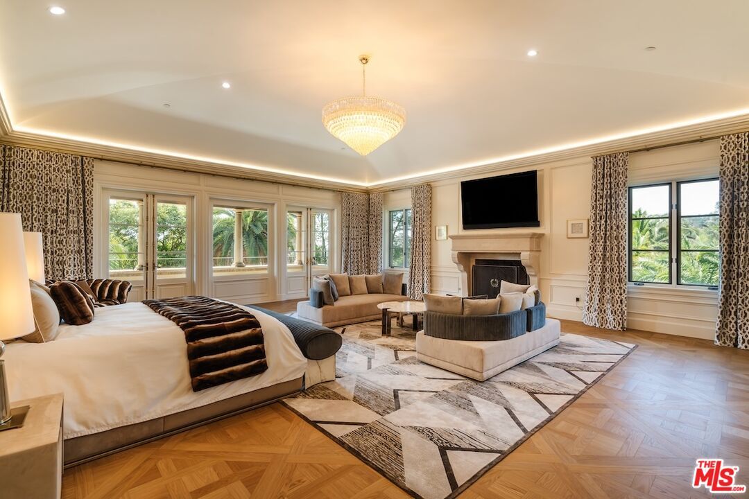 Bedroom, Chandelier, Fireplace, Interior, Recessed Lighting, Wood Texture Flooring