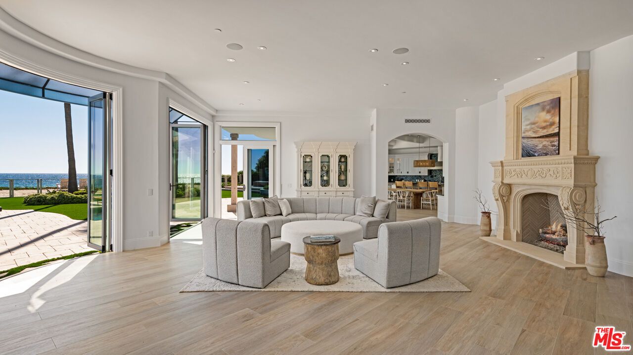 Fireplace, Interior, Living room, Pendant Lights, Recessed Lighting, Water, Wood Texture Flooring