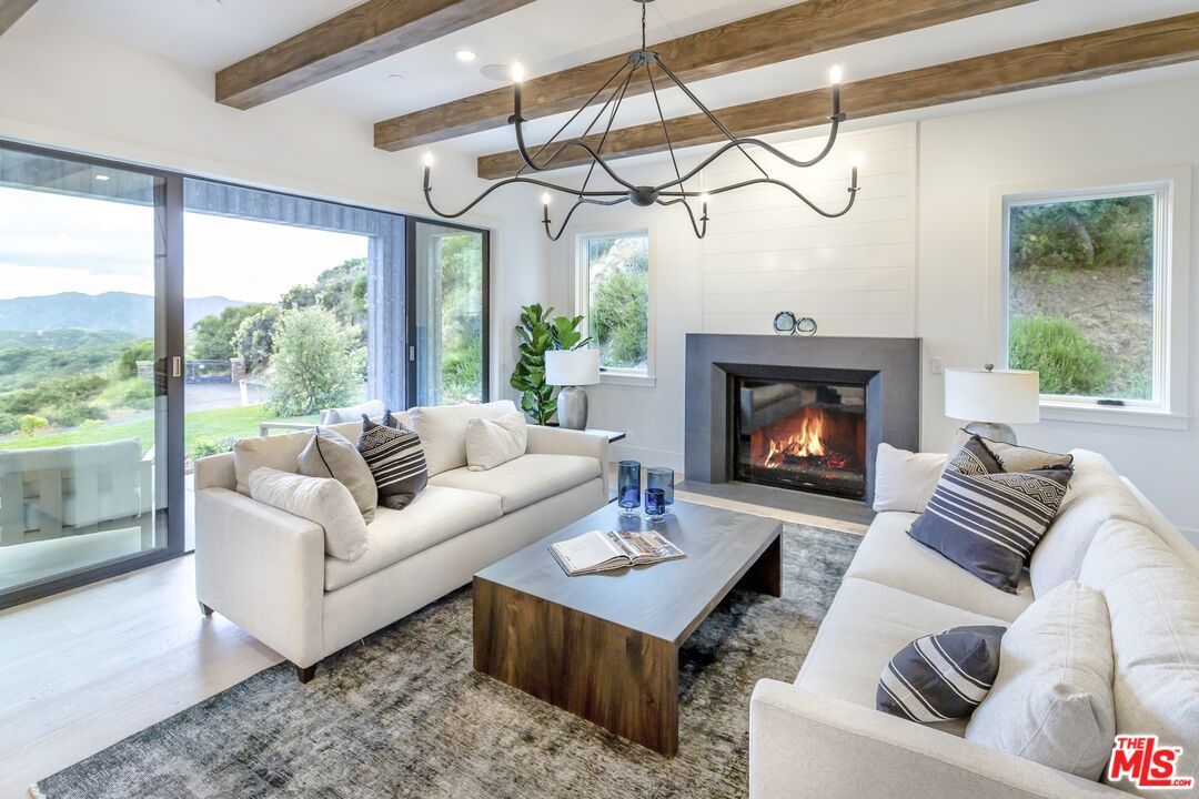 Fireplace, Interior, Living room, Pendant Lights, Recessed Lighting, Wooden Beams, Wood Texture Flooring