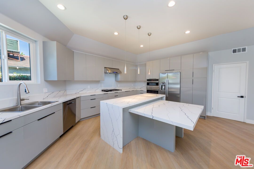 Interior, Kitchen, Pendant Lights, Recessed Lighting, Stainless Steel Appliances, Wood Texture Flooring
