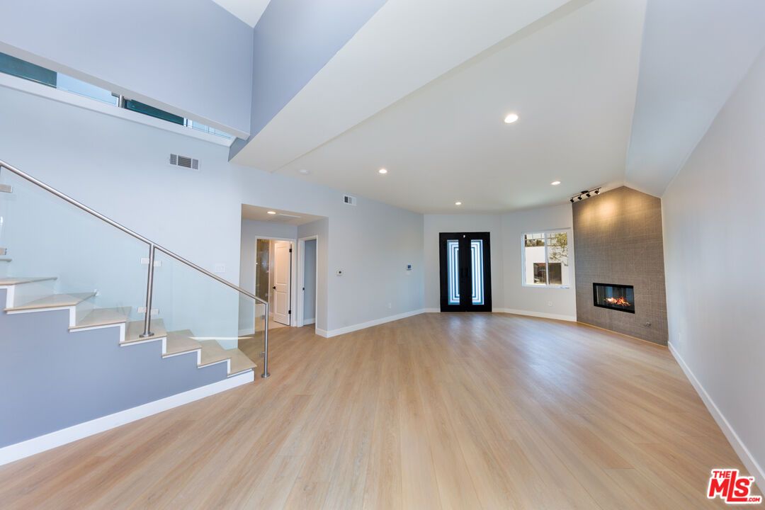 Empty room, Fireplace, Interior, Recessed Lighting, Wood Texture Flooring