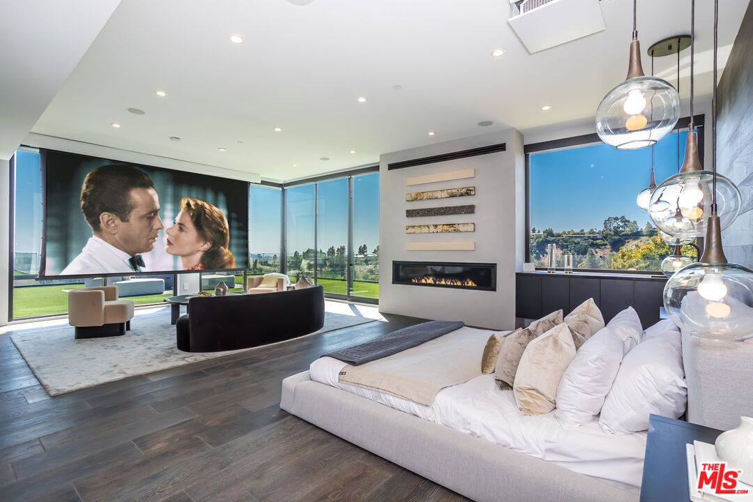 Bedroom, Fireplace, Interior, Pendant Lights, Recessed Lighting, Wood Texture Flooring