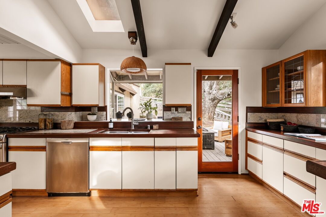 Interior, Kitchen, Stainless Steel Appliances, Tile Countertops, Wood Texture Flooring