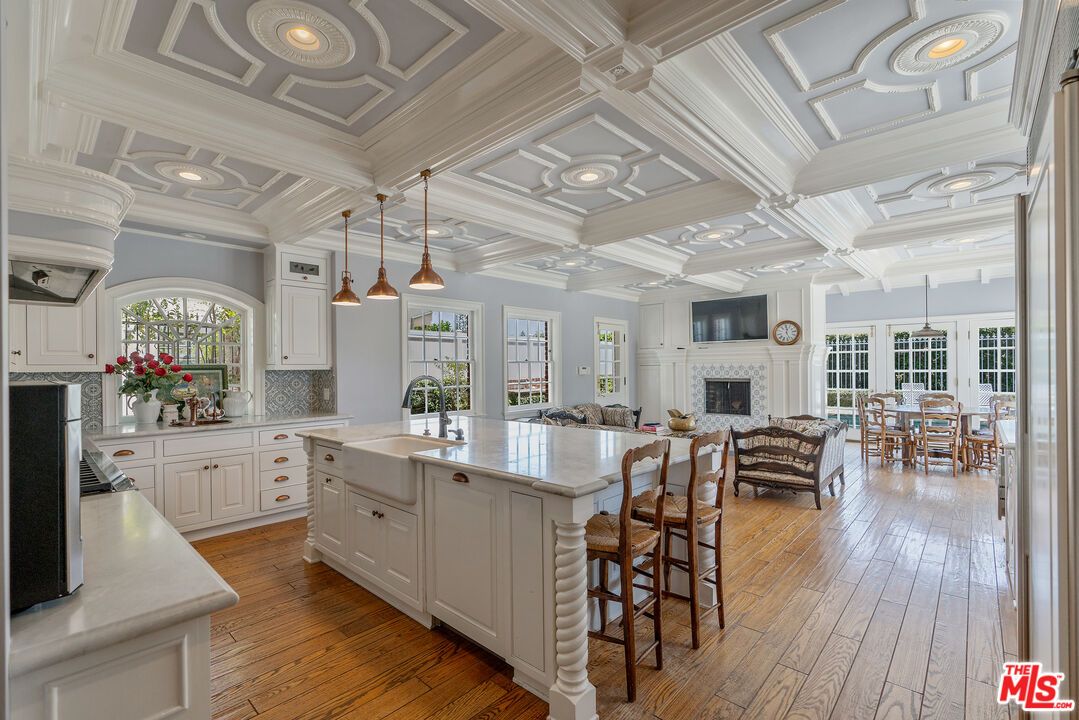 Dining room, Fireplace, Interior, Kitchen, Pendant Lights, Recessed Lighting, Wood Texture Flooring