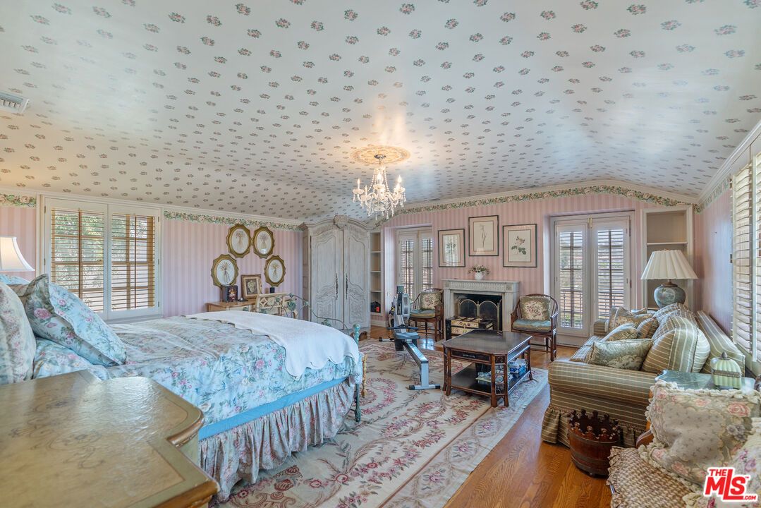 Bedroom, Chandelier, Fireplace, Interior, Wood Texture Flooring