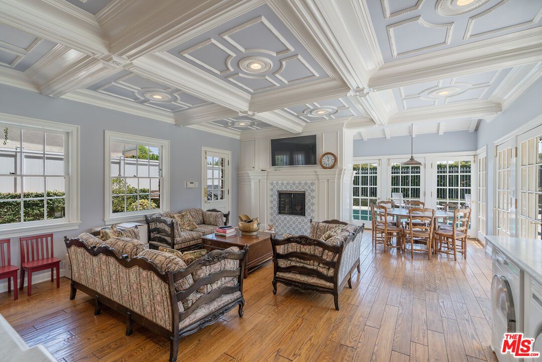 Dining room, Fireplace, Interior, Living room, Recessed Lighting, Wood Texture Flooring
