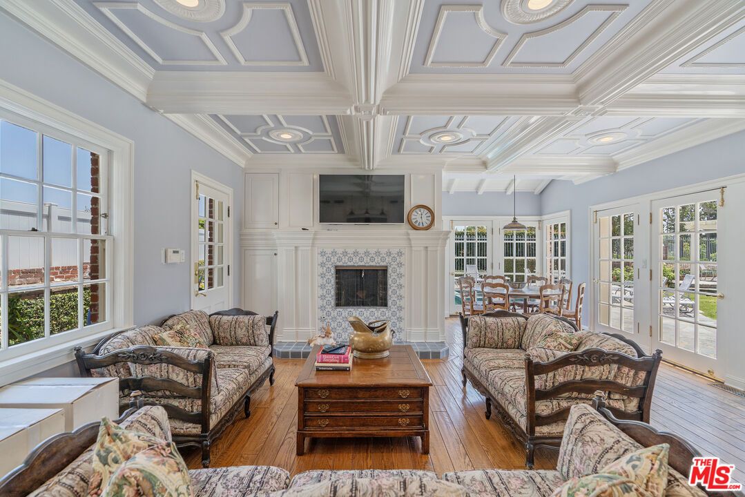Dining room, Fireplace, Interior, Living room, Recessed Lighting, Wood Texture Flooring